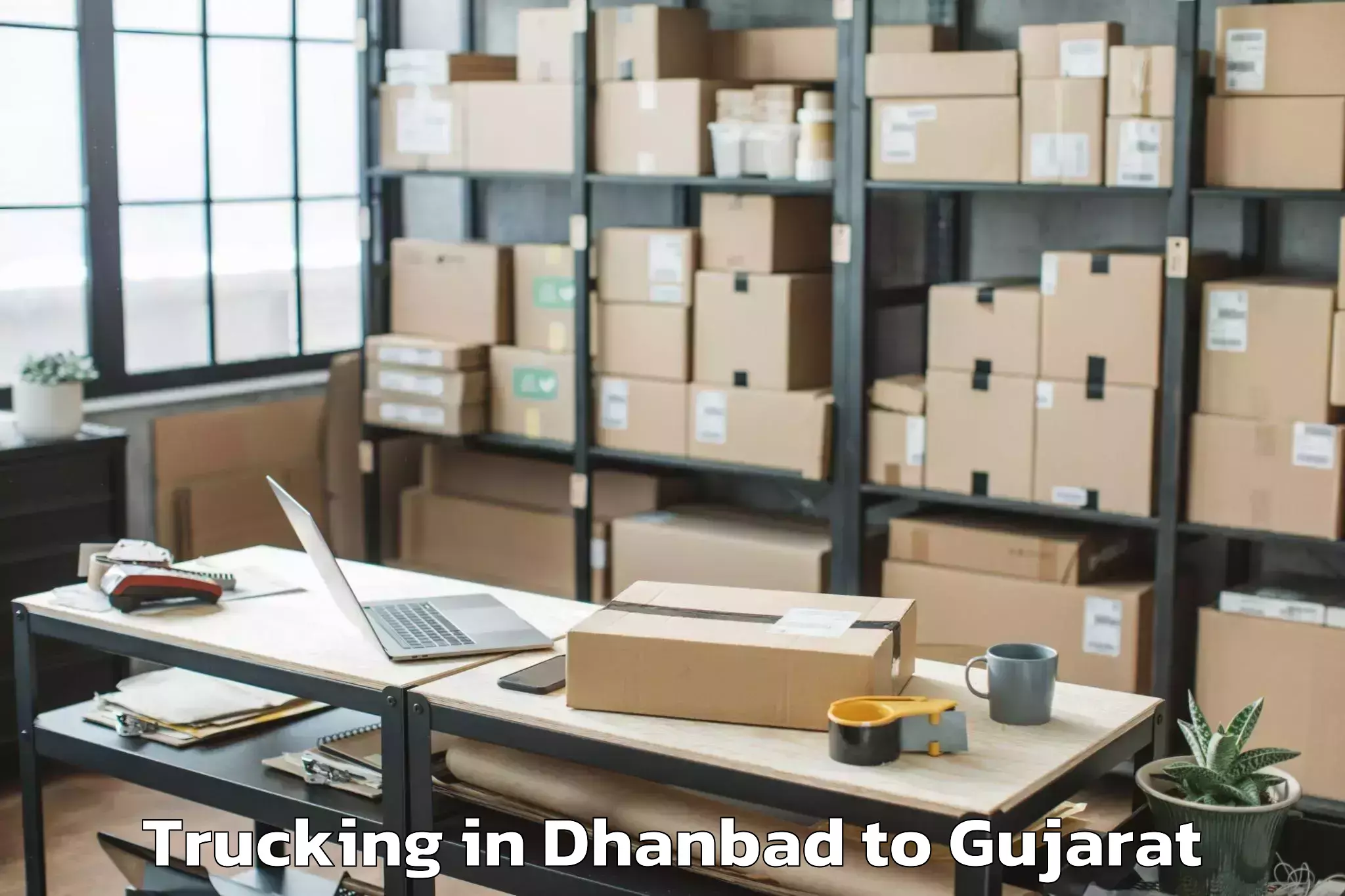 Affordable Dhanbad to Bhabhar Trucking